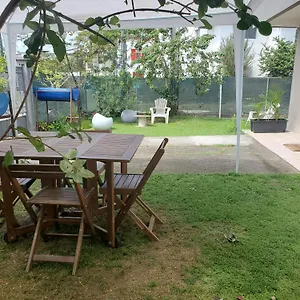 En Rez-de Jardin Clos Proche De L'aeroport Et Des Commodites Appartement